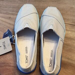TOMS Light Gray Canvas Slip-Ons with Blue Ombré Sole